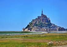 Visit Mont Saint Michel: A Small UNESCO World Heritage Island in the Normandy, France Cathedral Mont Saint Michel in the Normandy, France.